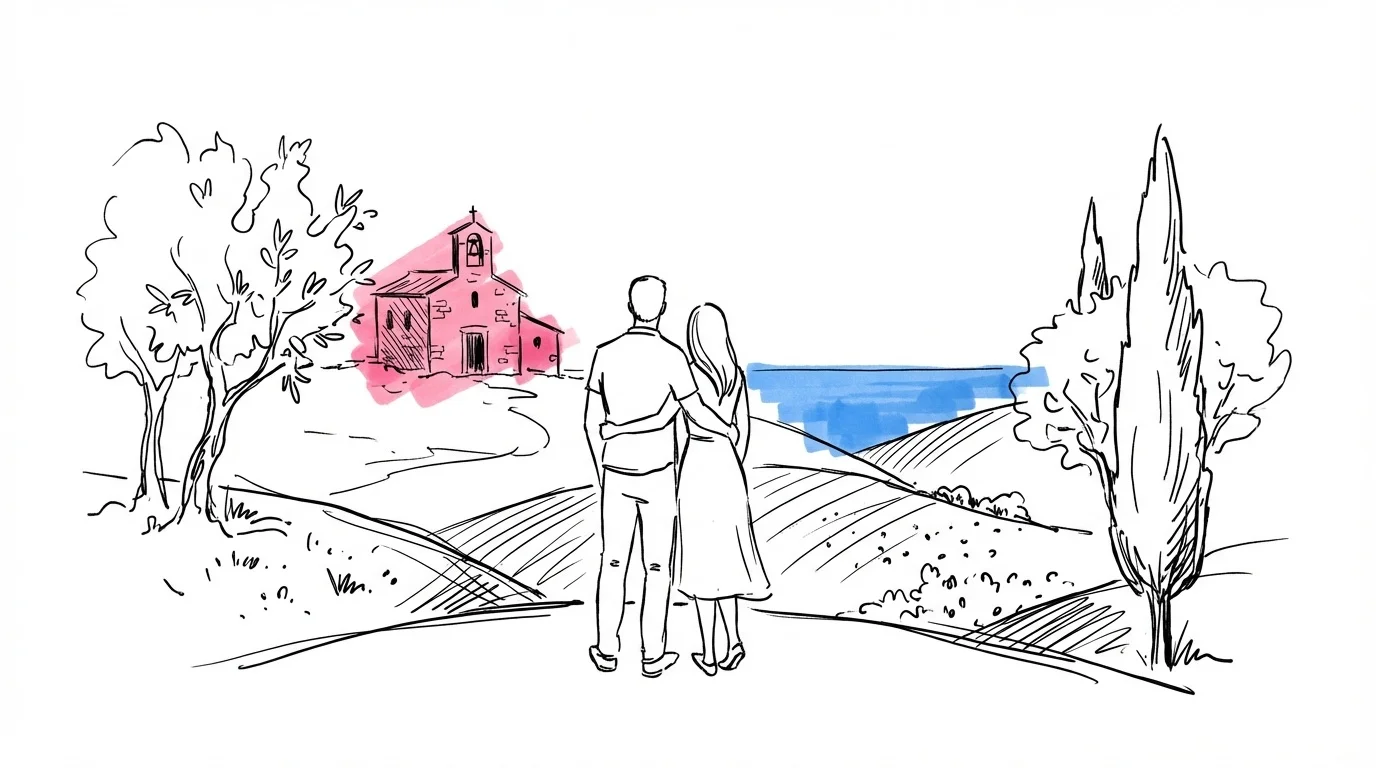 Par som blickar ut över ett medelhavs-landskap med kapell och olivträd — destinationsbröllop utomlands